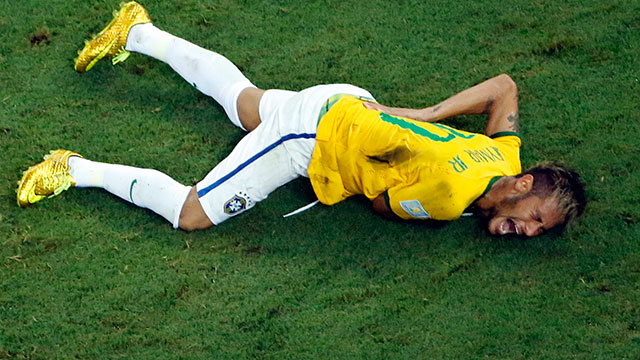 Neymar was kneed in the back in the 2-1 quarterfinal win over Colombia on Friday. He was crying in pain as he was carried off the field after a collision with Juan Zuniga. (Fabrizio Bensch/AP)