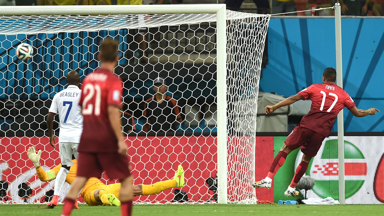 Nani (17) scores the opening goal of the Group G match between the USA and Portugal at the Arena da Amazonia in Manaus.