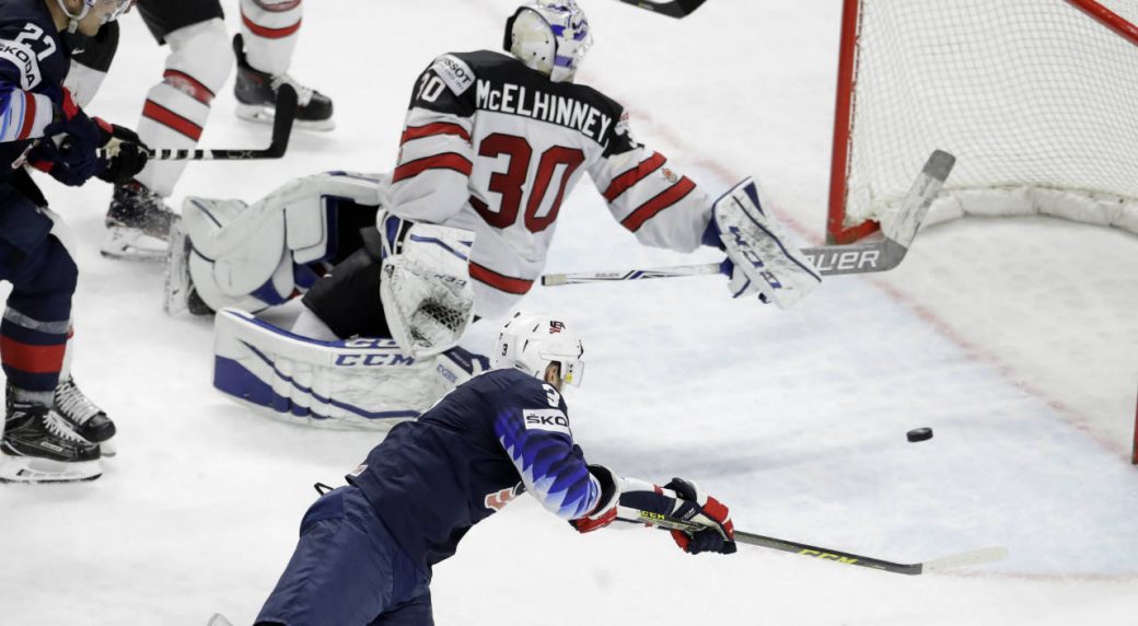 united states tops canada to claim bronze at hockey worlds nick bonino of the united states bottom scores his side s second goal during the ice hockey world championships bronze medal match between canada and the